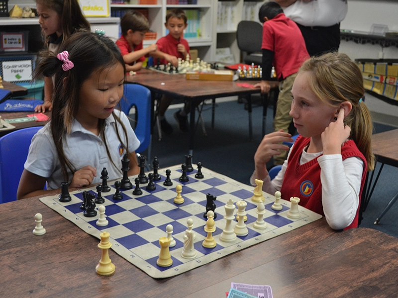 girls-playing-chess